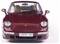 Roter Sportwagen von vorn mit Scheinwerfern und Kennzeichen 'S PR 139'. Innenraum mit beigen Sitzen sichtbar.