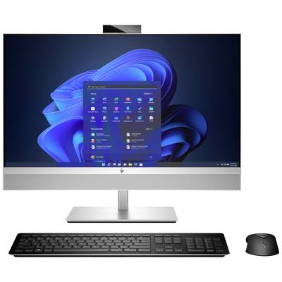 Ein Desktop-Computer mit einem großen Bildschirm zeigt das Windows-Startmenü. Vor dem Bildschirm befinden sich eine Tastatur und eine Maus.