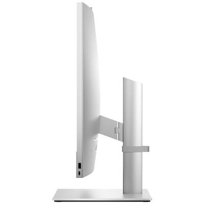 Ein schlanker Computerbildschirm von der Seite, silbern mit schmalem Standfuß, zwei USB-Anschlüsse an der Seite sichtbar.