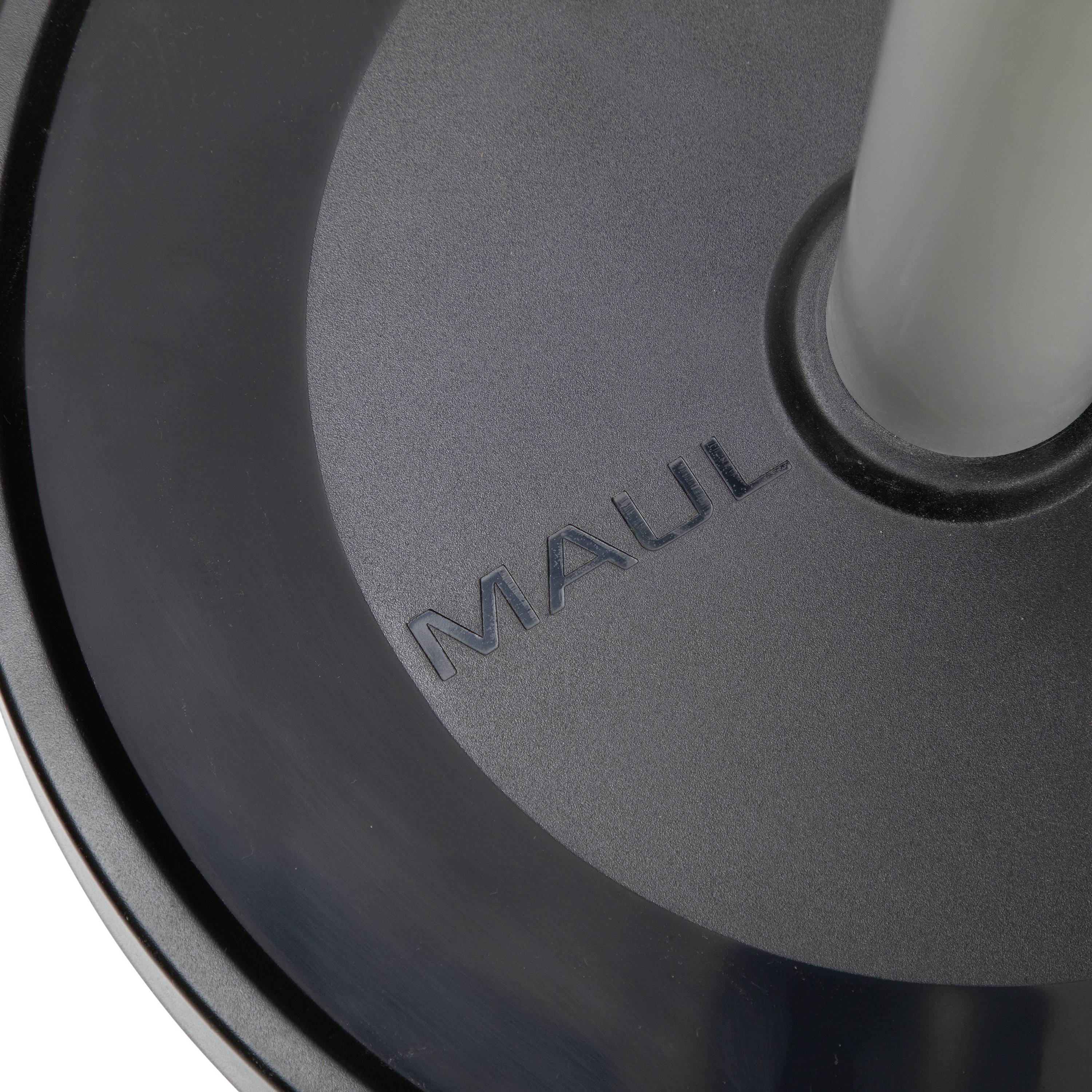 Eine schwarze Metallscheibe mit der Prägung 'MAUL', befestigt an einem zylindrischen Metallständer.