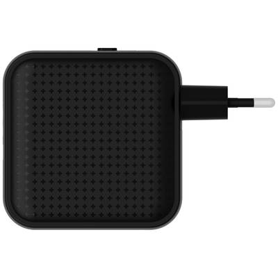 Ein quadratisches, schwarzes Ladegerät mit einem europäischen Stecker ist abgebildet, auf einer grauen Oberfläche liegend.