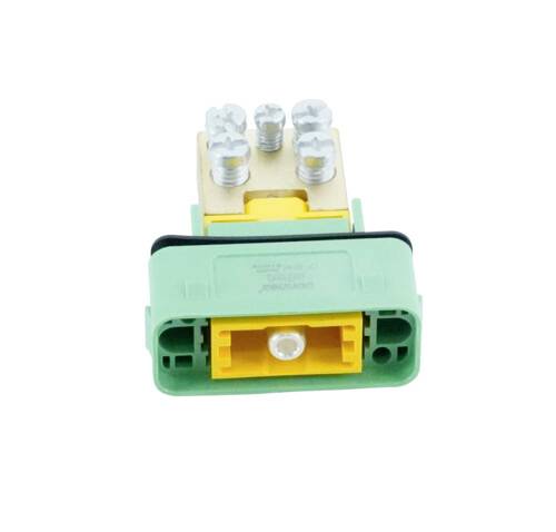 Ein rechteckiger, gelb-grüner elektrischer Stecker mit sechs silbernen Schrauben oben und einem zentralen Anschluss in der Mitte.