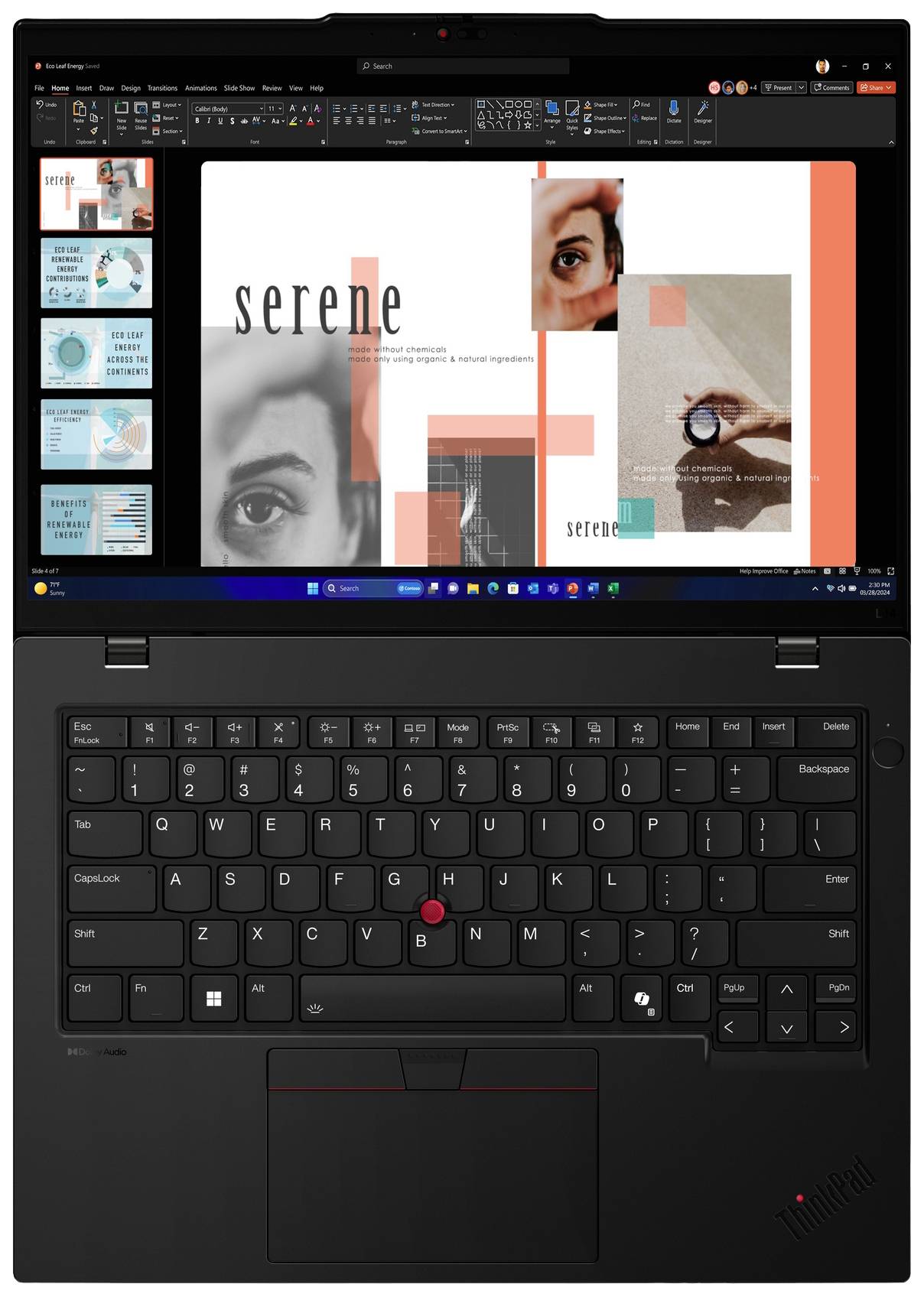 Laptop mit geöffnetem Bildschirm, der eine Präsentation zeigt. Präsentationstitel 'serene' mit Bildern und Text. Tastatur sichtbar.