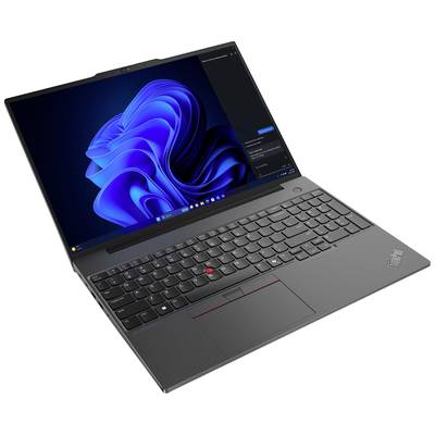 Ein geöffneter Laptop mit schwarzer Tastatur und einem Bildschirm, der das Windows 11 Hintergrundbild zeigt.