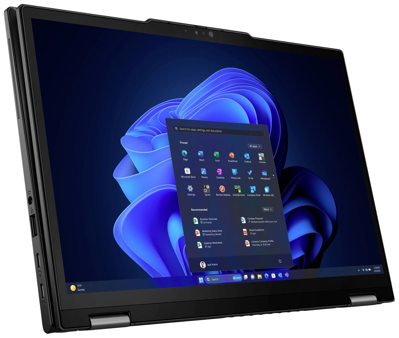 Ein Laptop mit geöffnetem Windows-Betriebssystem, das Startmenü angezeigt. Der Bildschirm zeigt das neue Windows 11 Hintergrundbild.