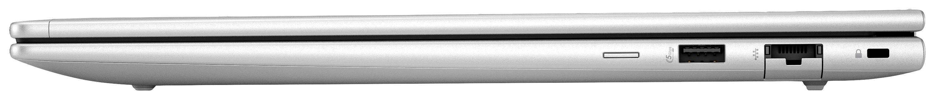 Seitenansicht eines geschlossenen Laptops, der verschiedene Anschlussmöglichkeiten wie USB- und Netzwerkanschlüsse zeigt.