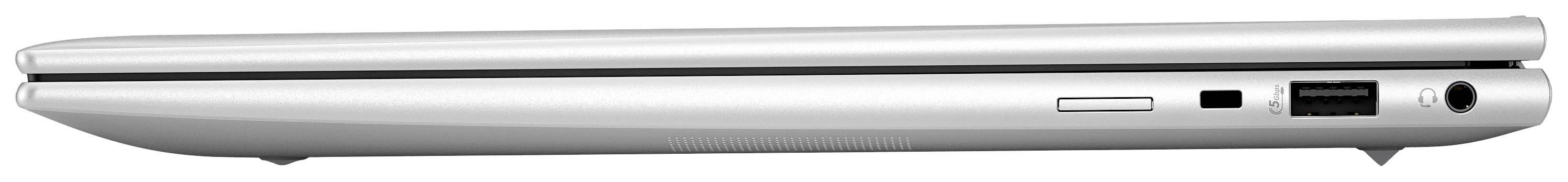 Silberner Laptop von der Seite, geschlossen. Zu sehen sind ein USB-Anschluss und ein Audioanschluss auf der rechten Seite.