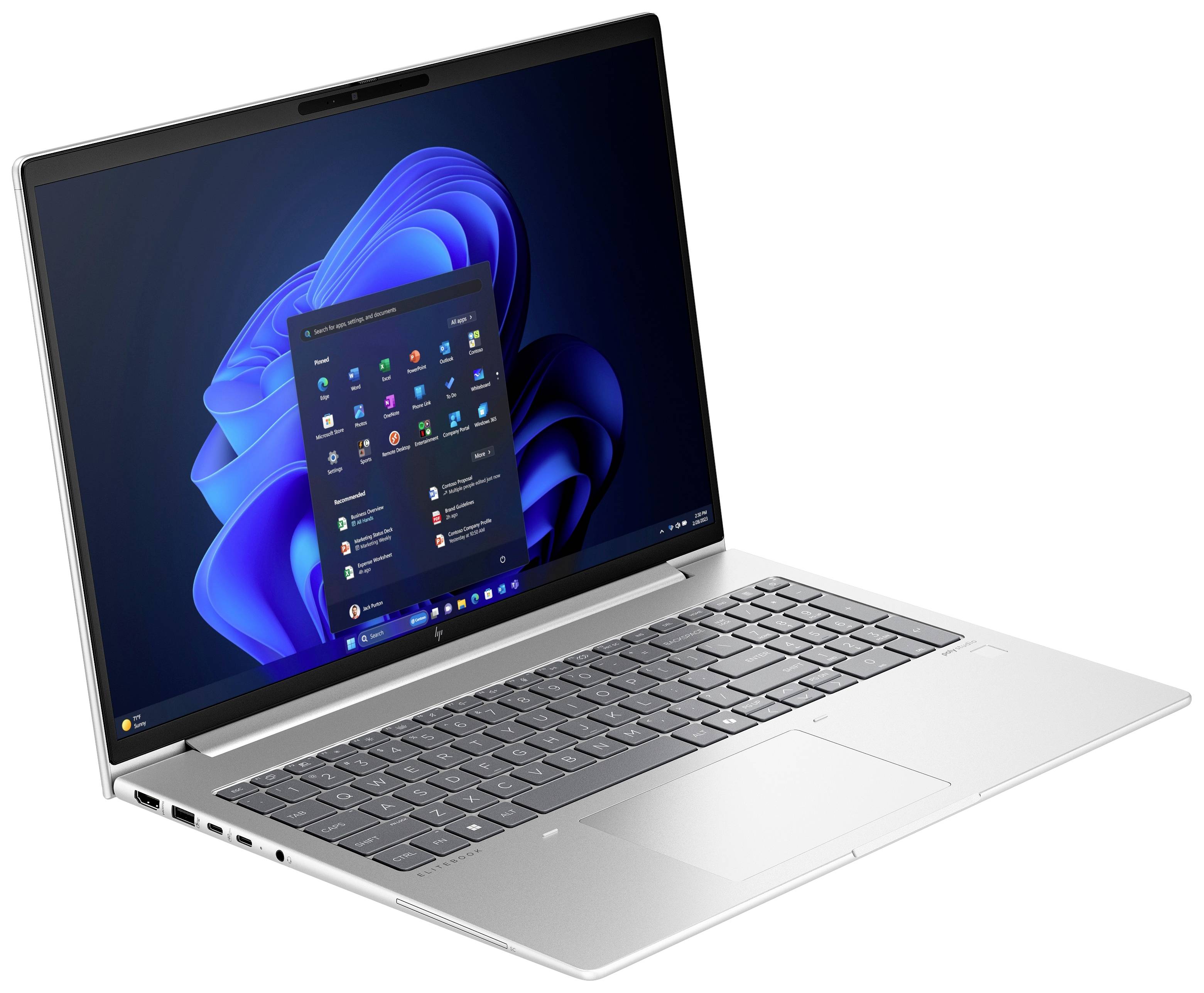 Laptop mit geöffnetem Windows 11-Startmenü auf dem Bildschirm, zeigt Apps und Funktionen. Silbernes Gehäuse, QWERTY-Tastatur.
