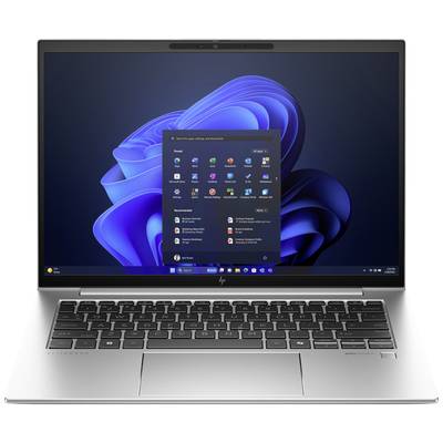 Ein Laptop mit geöffneter Windows-Startseite auf dem Bildschirm, zeigt verschiedene App-Symbole unter einer blauen Benutzeroberfläche.