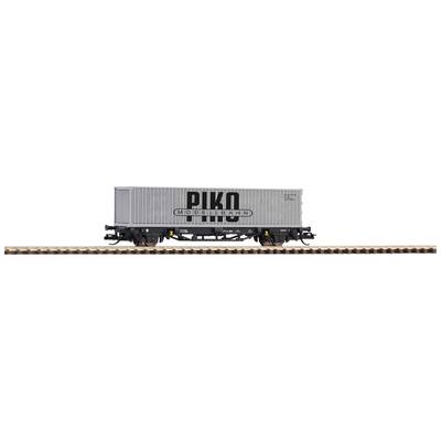 Grau-grauer Güterwaggon mit 'PIKO' Aufschrift auf einem kurzen Gleisstück.