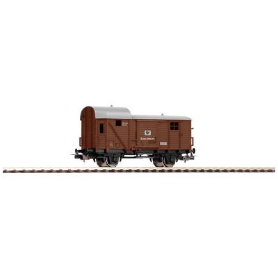 Ein brauner Güterwagen mit der Aufschrift 'Ommbu 33 802' steht auf einem Gleis. Der Wagen hat ein gewölbtes Dach und Schiebetüren.