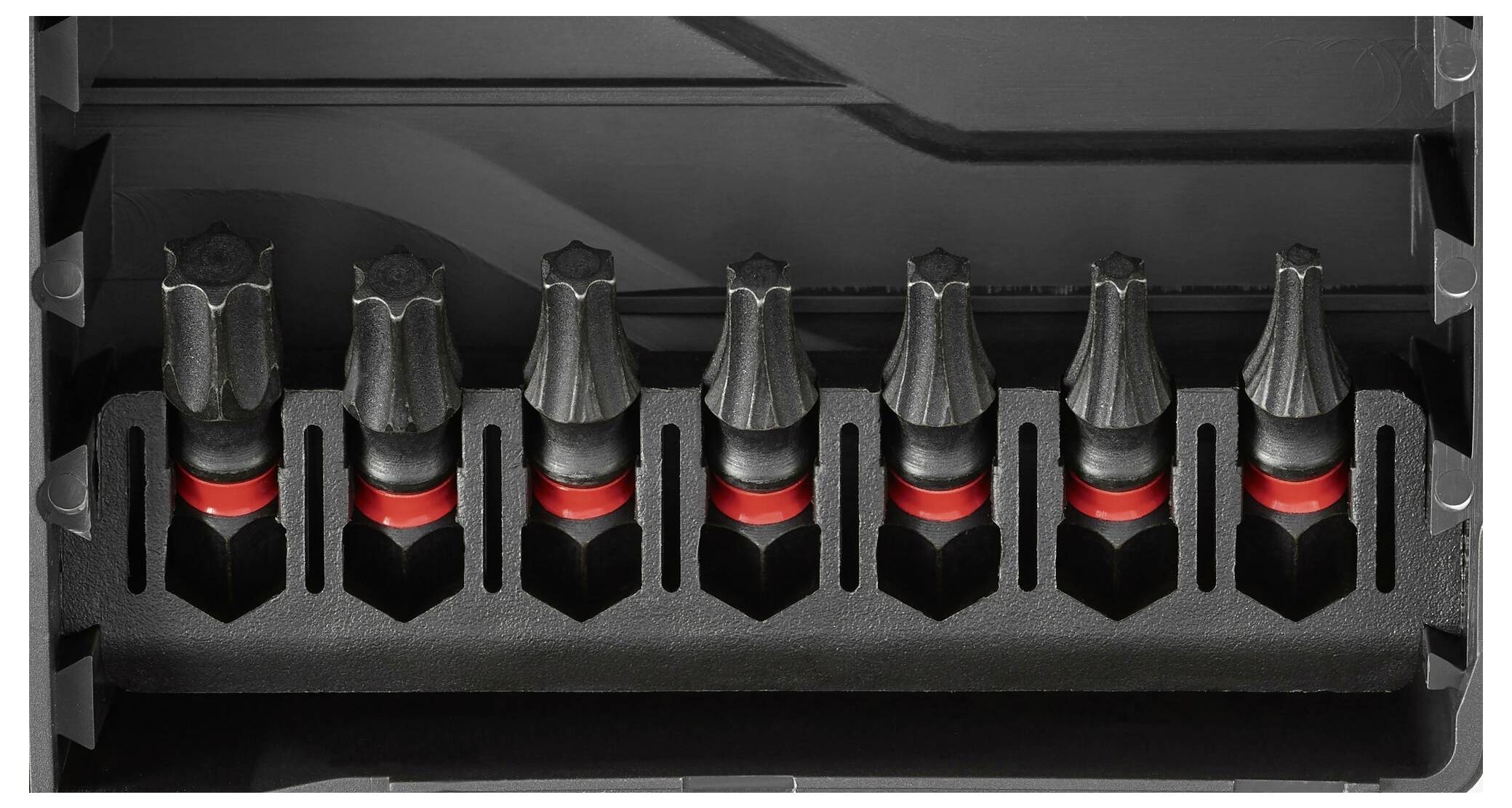 Eine schwarze Werkzeugbox enthält sechs sternförmige Schraubendreher-Bits mit roten Markierungen zur Erkennung verschiedener Größen.