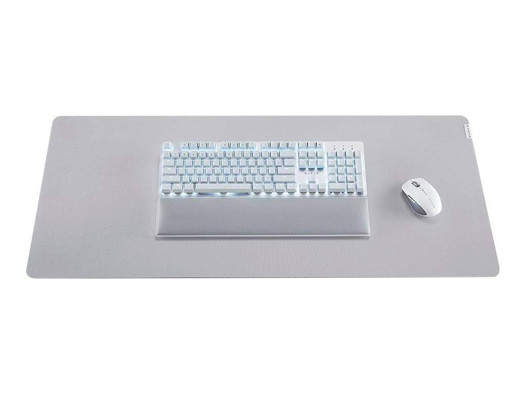 Graues Schreibtischset mit weißer Tastatur mittig platziert und weißer Maus rechts daneben.