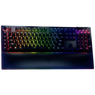 Schwarze Gaming-Tastatur mit Regenbogen-LED-Hintergrundbeleuchtung und Handballenauflage.