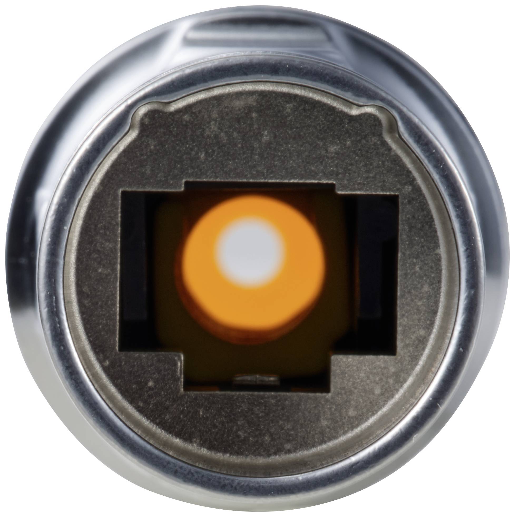 Ein orange leuchtender, runder Knopf in der Mitte eines metallischen, kreisförmigen Gehäuses.