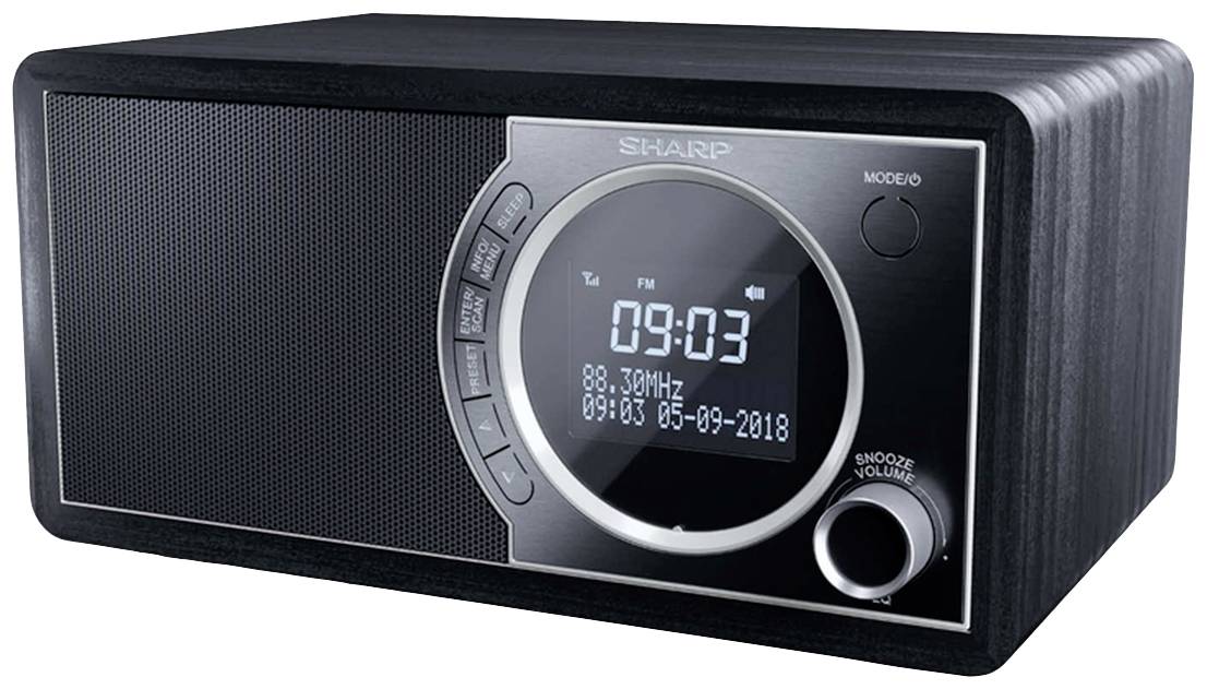 Ein schwarzes, rechteckiges Digitalradio mit LED-Anzeige, zeigt '09:03' an. Knöpfe für Lautstärke und Modus sind sichtbar.