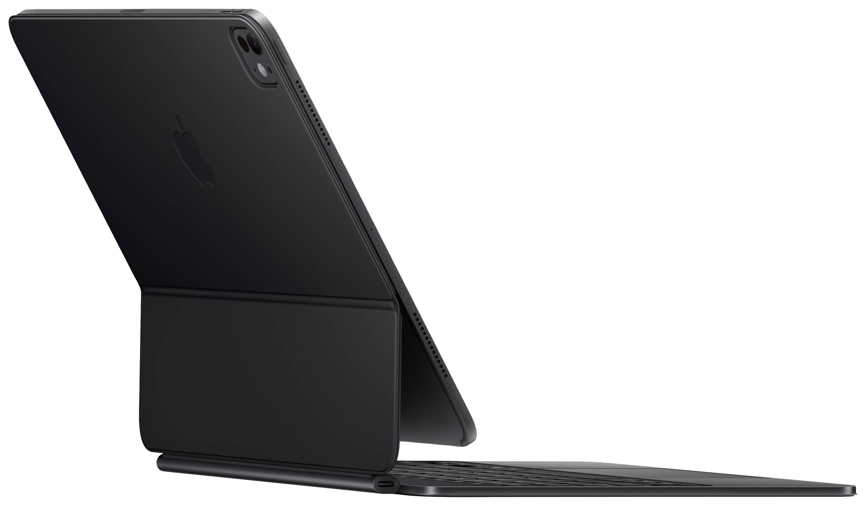 Ein Tablet in einem schwarzen Tastatur-Dock aus seitlicher Perspektive. Es steht auf einem Tisch und das Display ist nicht sichtbar.