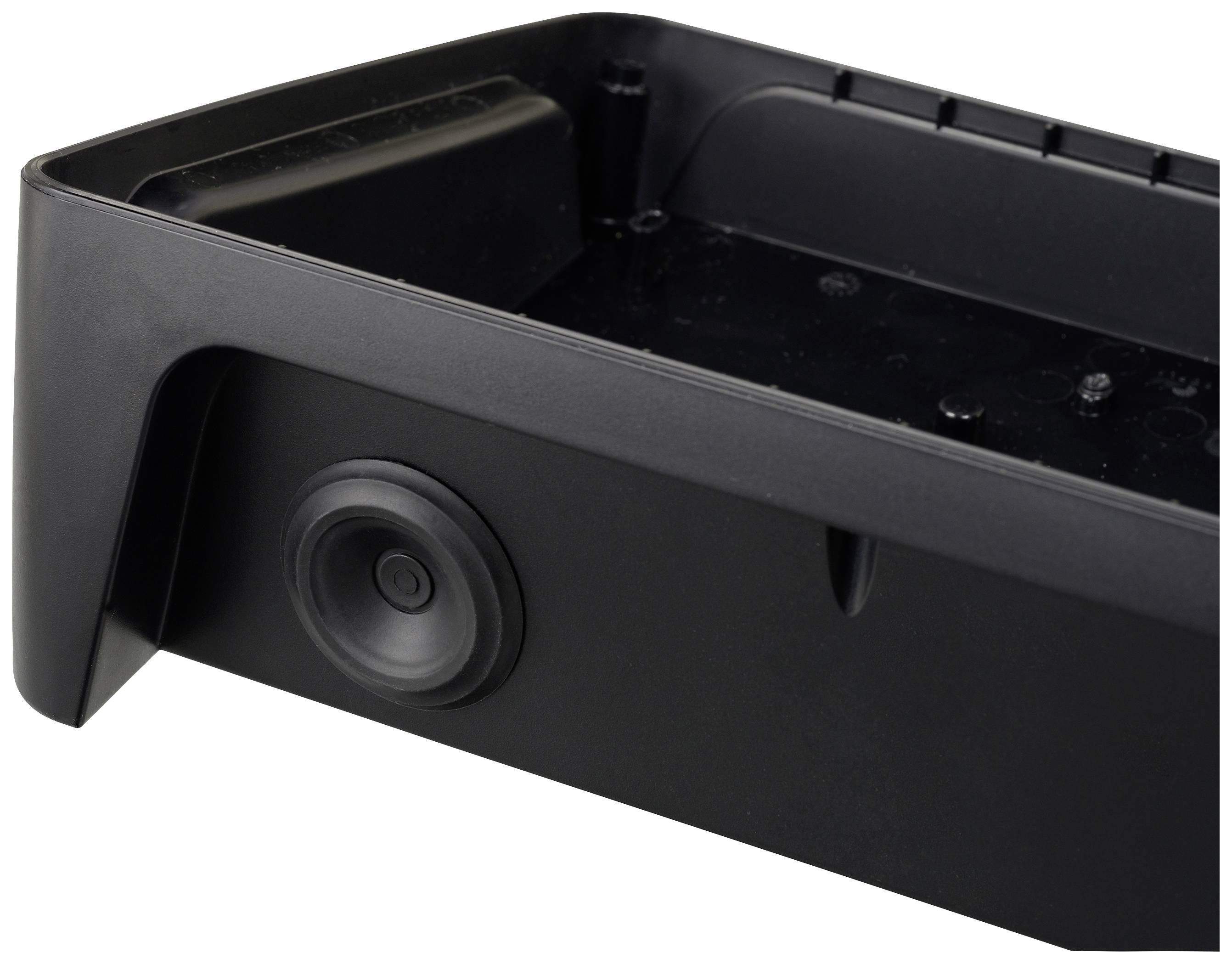 Ein schwarzes Plastik-Gestell mit einem runden Gummifuß an der Seite, vermutlich Teil eines technischen Geräts oder einer Halterung.