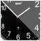 Eine Nahaufnahme einer analogen Uhr, die die Zeit auf etwa 2:11 Uhr anzeigt. Das Zifferblatt ist schwarz mit weißen Ziffern und Zeigern.