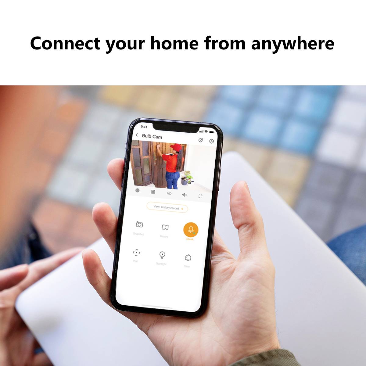 Person hält Smartphone mit geöffneter 'Bub Cam'-App, zeigt Überwachungsstream. Text oben: 'Connect your home from anywhere'.