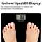 Elektronische Waage mit LED-Anzeige zeigt '76 kg'. Füße stehen darauf. Text oben: 'Hochwertiges LED Display'.