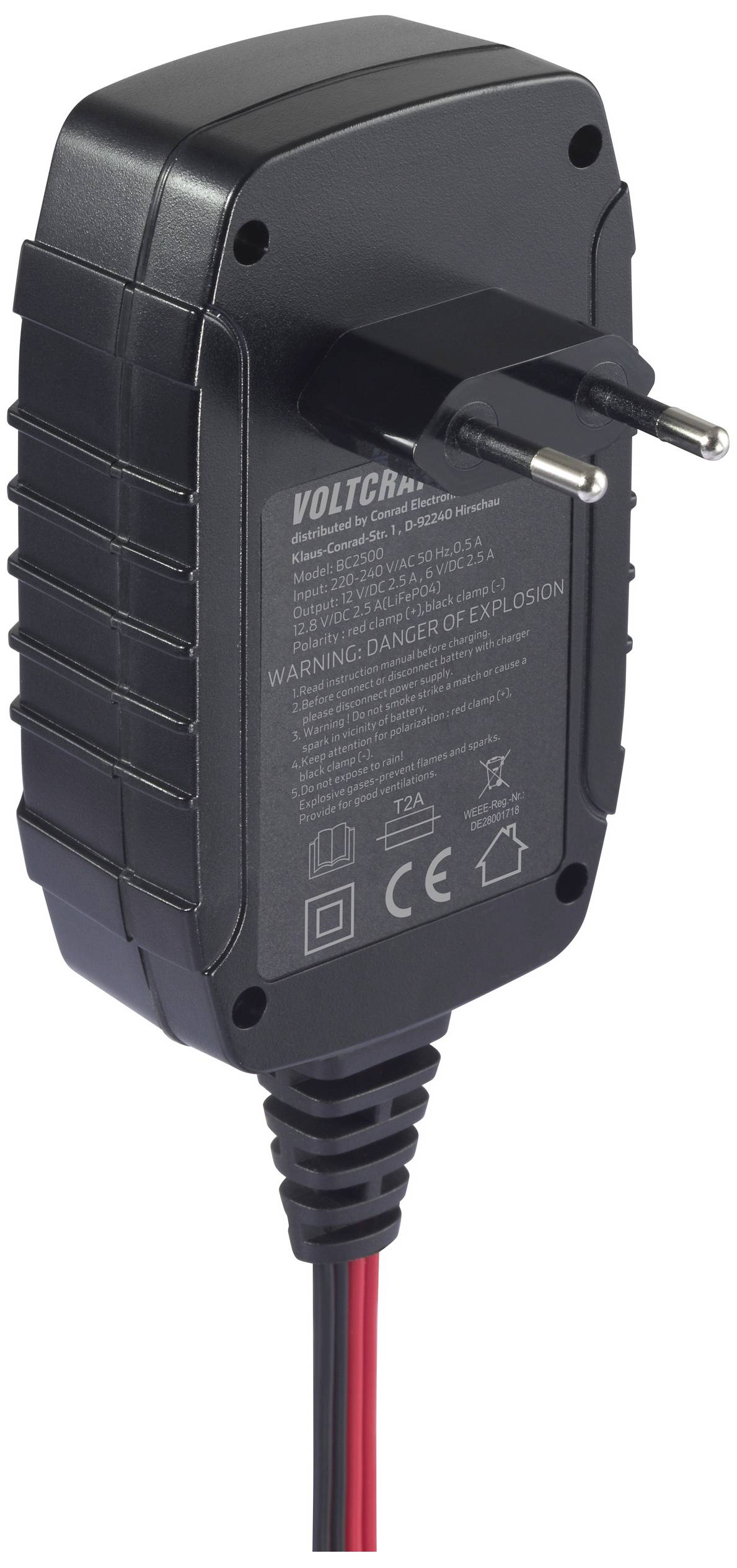 Ein schwarzes Netzteil mit zwei Stiften und einem fest verbundenen Stromkabel. Gehäuse mit rutschfesten Rillen. Text und Symbole auf der Vorderseite.