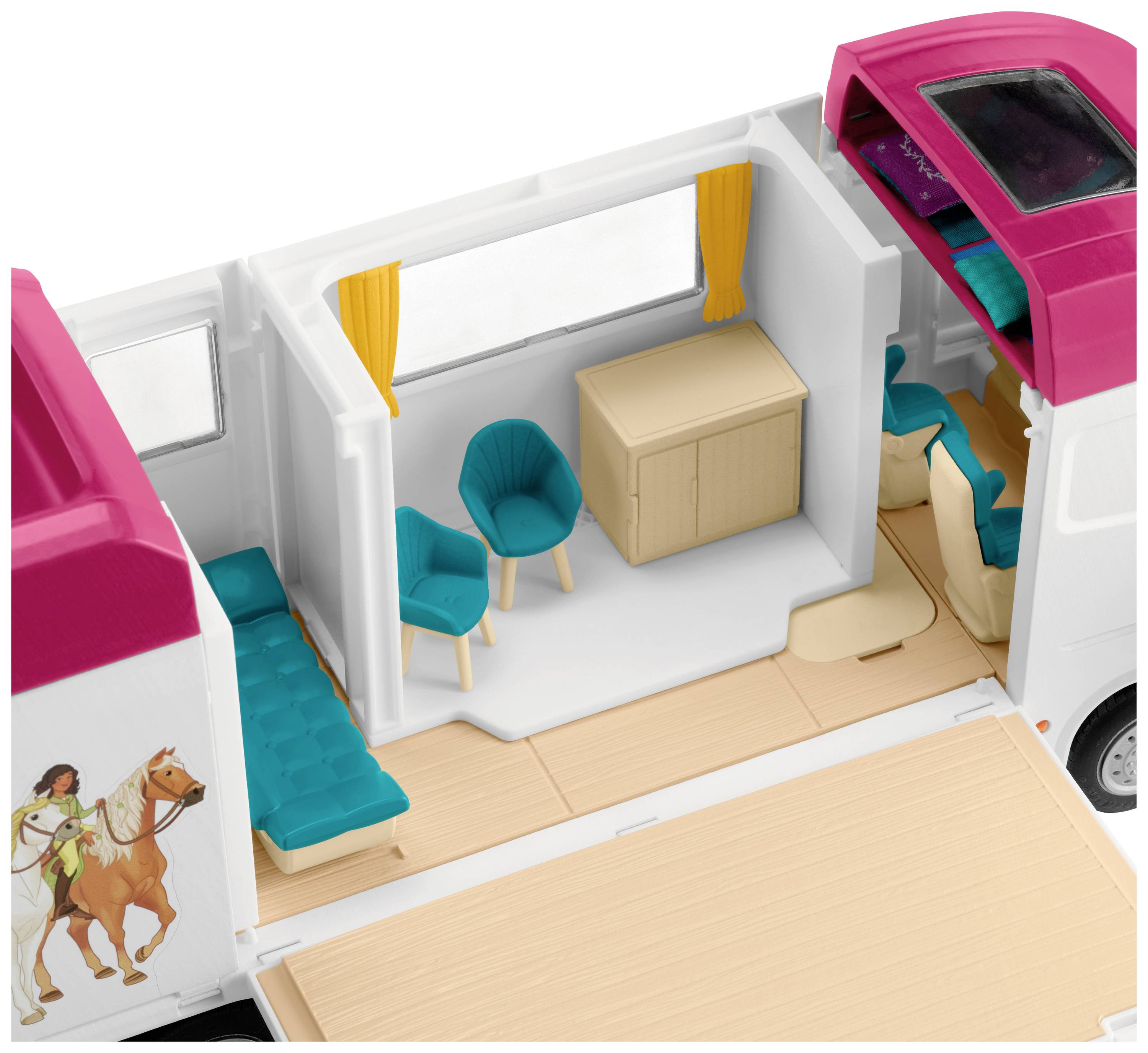 Ein offener Kunststoff-Pferdetransporter mit detailreicher Inneneinrichtung: Sitze, ein Tisch und ein kleiner Stauraum.