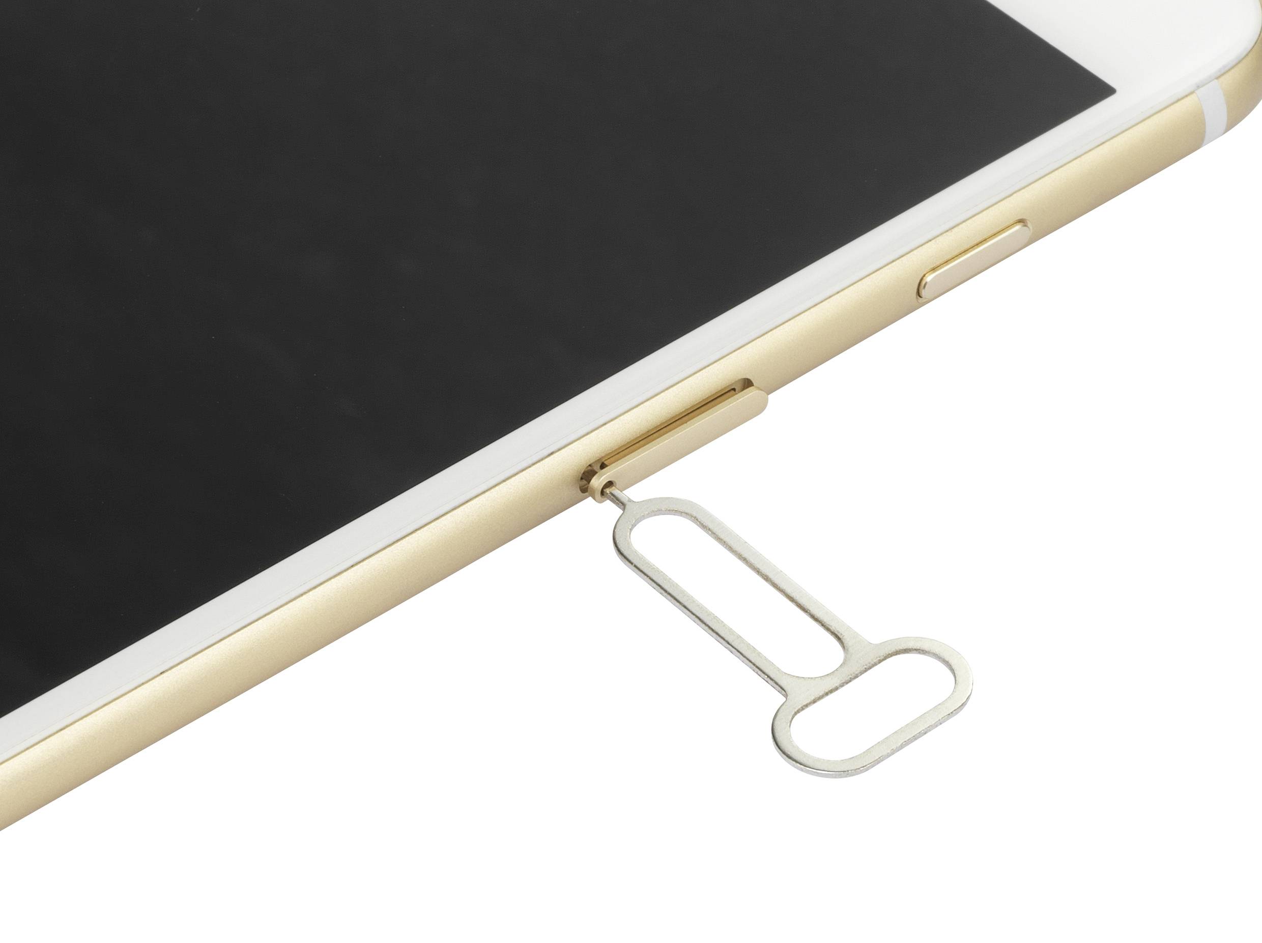 Ein Smartphone liegt flach, während ein SIM-Karten-Auswurftool im Fach steckt, um die SIM-Karte zu entfernen.