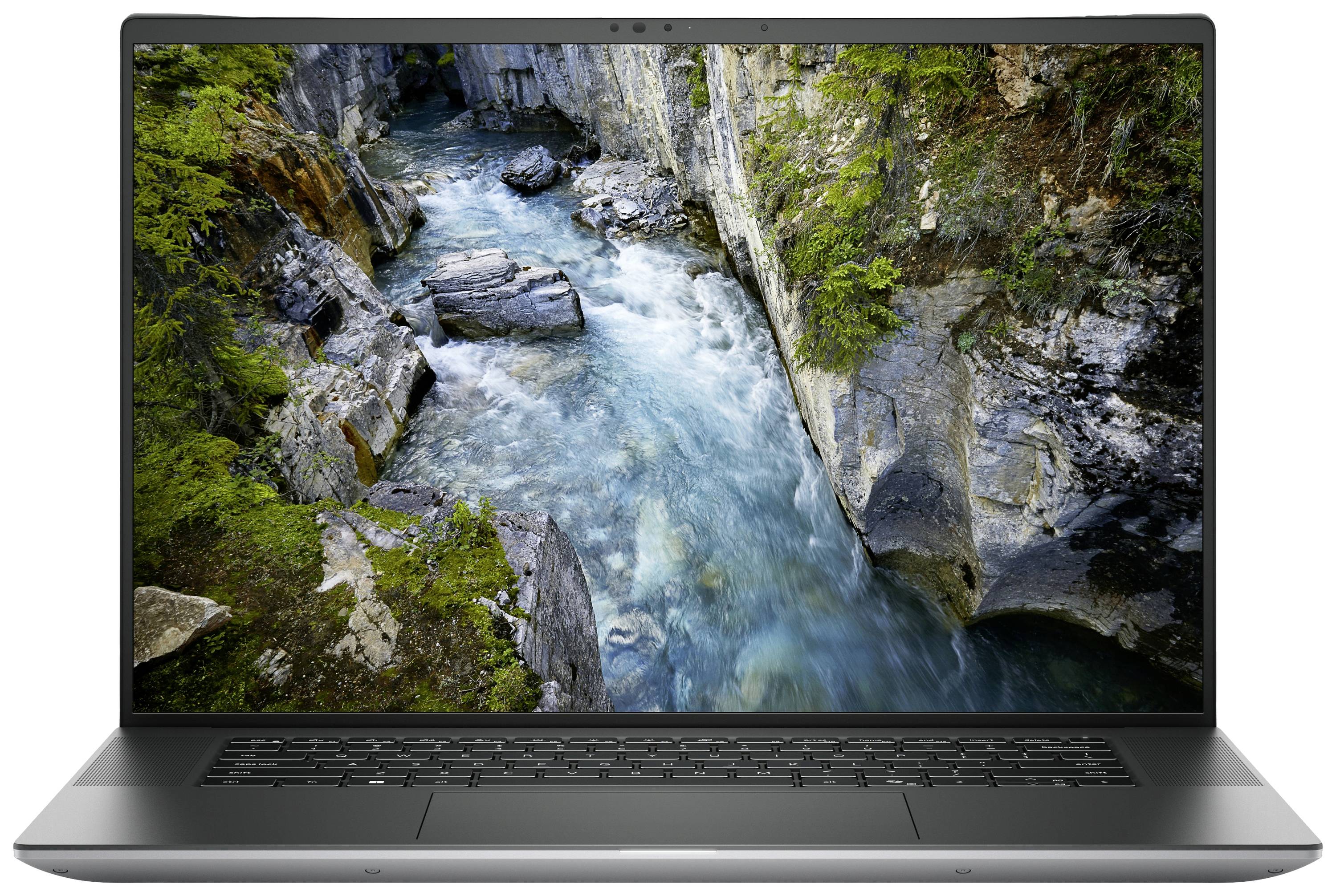 Ein Laptop-Bildschirm zeigt eine felsige Schlucht mit einem fließenden Fluss und umgebendem Grün.