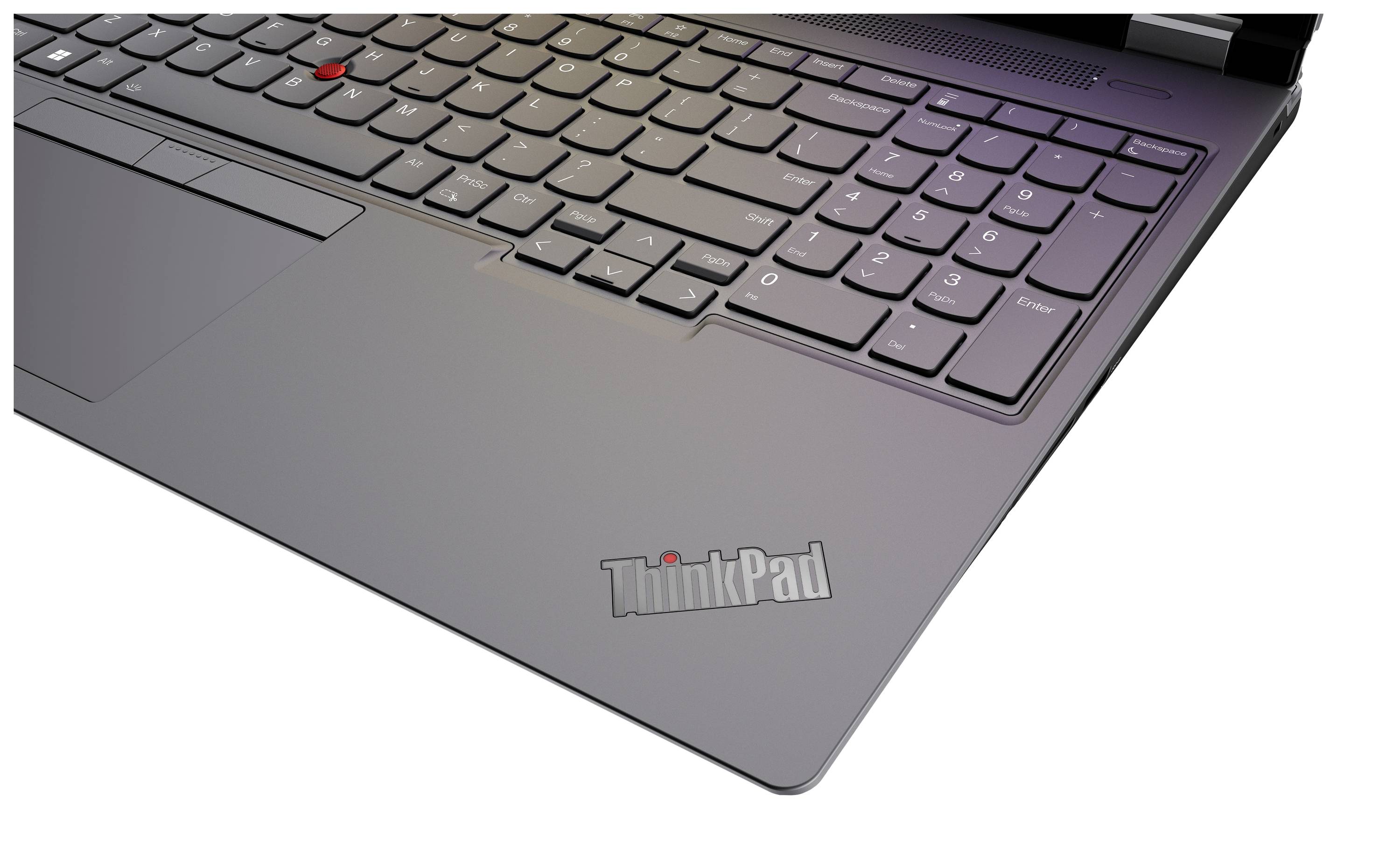 Ein Laptop daneben zu sehen, mit einem 'ThinkPad'-Logo. Die Tastatur ist beleuchtet und einige Tasten sind hervorgehoben.