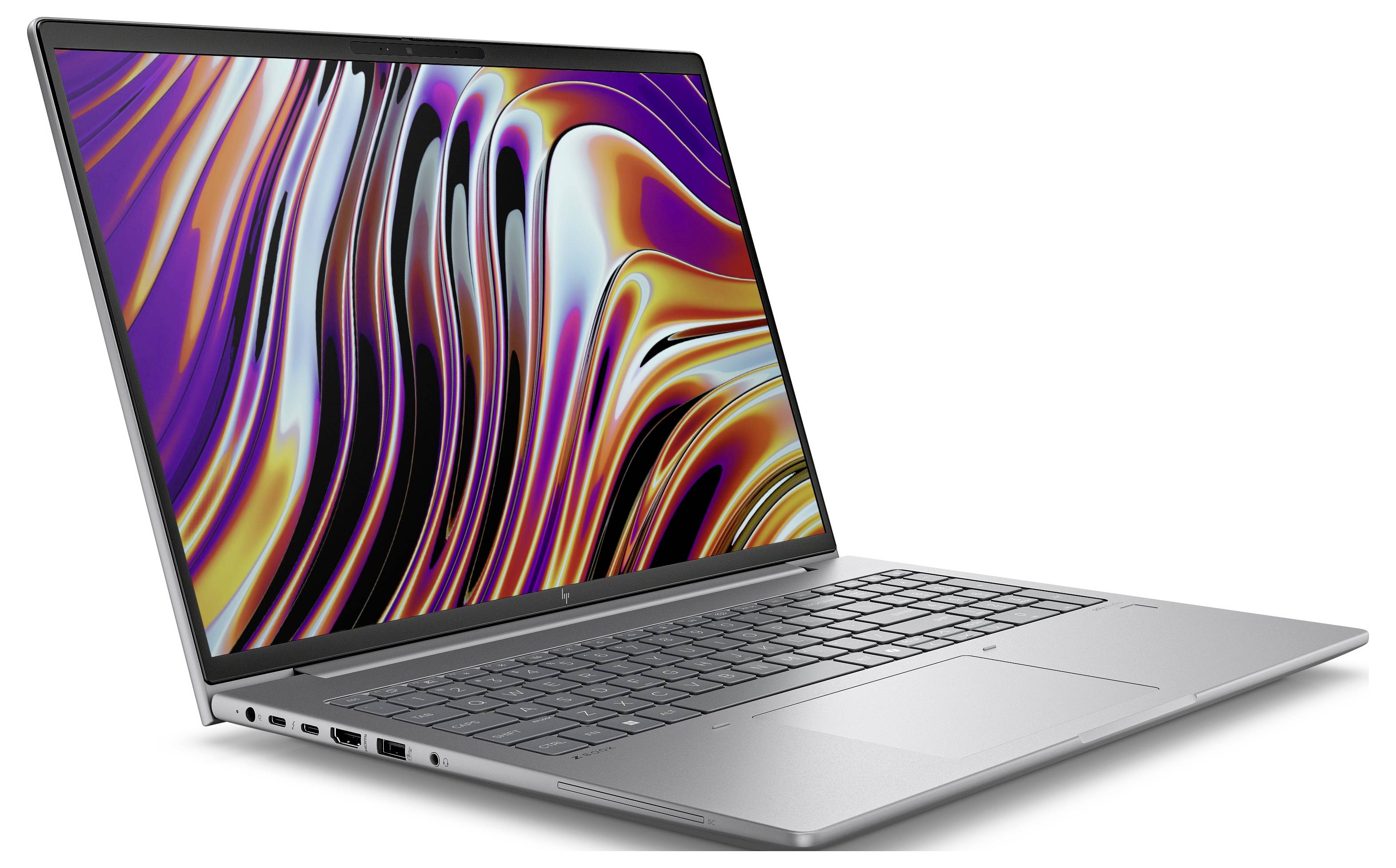 Ein silberner Laptop mit einem geöffneten Bildschirm zeigt bunte, abstrakte Kunst auf dem Display.