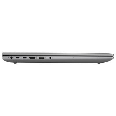 Seitenansicht eines geschlossenen Laptops mit verschiedenen Anschlüssen wie USB, HDMI und SD-Kartenleser, betont die Anschlussvielfalt.