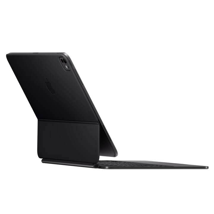 Ein schwarzes Tablet steht auf einer angedockten Tastatur, diagonal von hinten betrachtet.