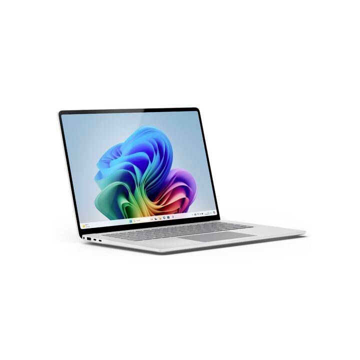 Ein moderner Laptop mit einem farbenfrohen Bildschirmhintergrund, der eine abstrakte, wellenartige Form zeigt.