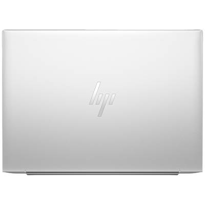 Ein silberner Laptopdeckel mit dem Logo eines bekannten Computerherstellers in der Mitte.