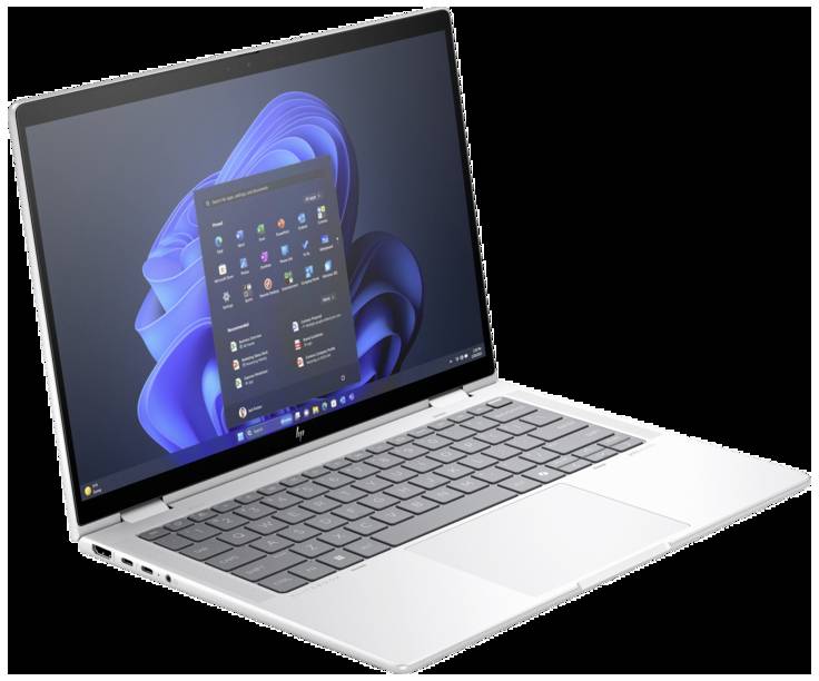 Silberner Laptop mit geöffnetem Display zeigt Desktop-Oberfläche von Windows 11. Tastatur und Touchpad sind sichtbar.
