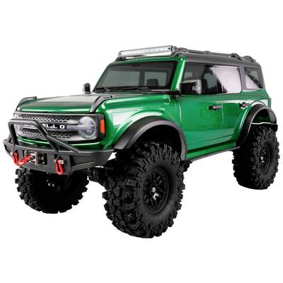 Grünes ferngesteuertes Spielzeugauto im Geländewagenstil mit großen Rädern und detaillierter Karosserie, ideal für Offroad-Abenteuer.