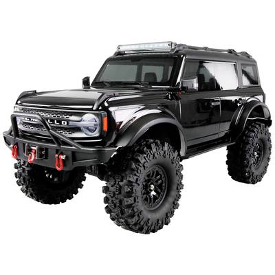 Schwarzes, robustes Geländewagen-Modell mit großer Bodenfreiheit und Offroad-Reifen, geeignet für unwegsames Gelände.