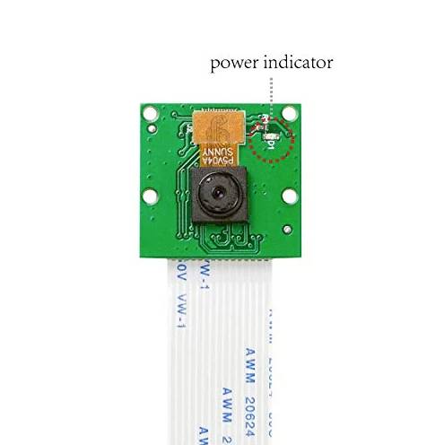 Grüne elektronische Platine mit Linse in der Mitte, Aufschrift 'power indicator' oben rechts zeigt auf LED-Anzeige.