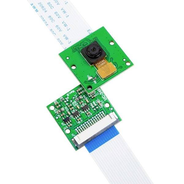 Kompakte, grüne Platine mit Kamera und Flachbandkabel. Komponenten sind für Elektronikprojekte und Mini-Computersysteme geeignet.