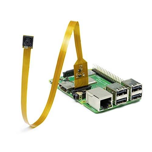 Eine kleine grüne Platine mit USB-Anschlüssen und einem angeschlossenen Flachbandkabel, das in eine Kamera mündet.