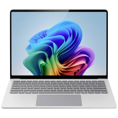 Ein Laptop mit einem farbenfrohen, wellenförmigen Muster auf dem Bildschirm.