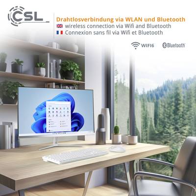 Ein Schreibtisch mit einem Computerdisplay, auf dem ein Windows-Desktop angezeigt wird. Umgebung mit Pflanzen und Waldblick.