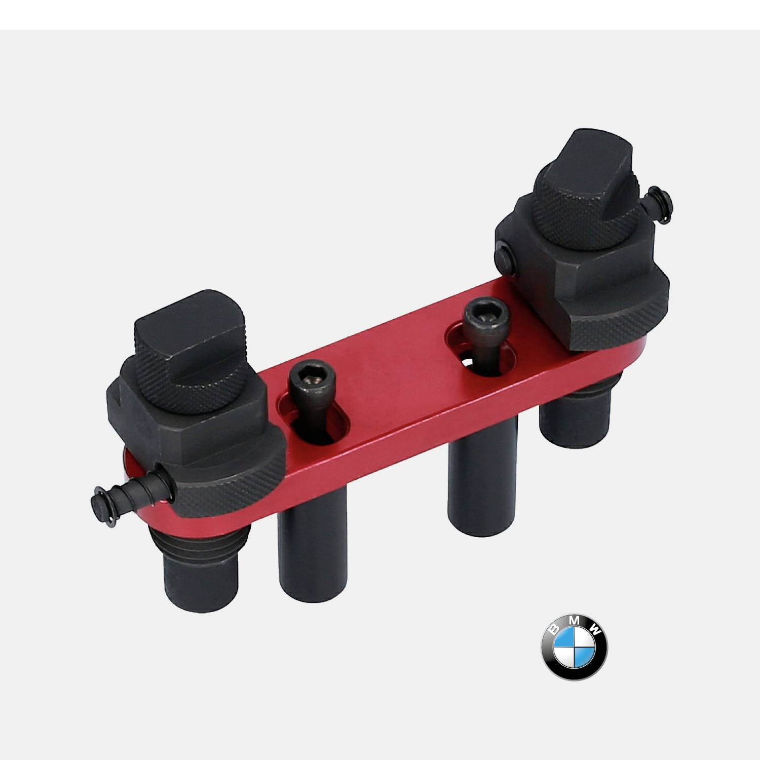 Rotes Kfz-Spezialwerkzeug zur Motorwartung mit BMW-Logo unten rechts.