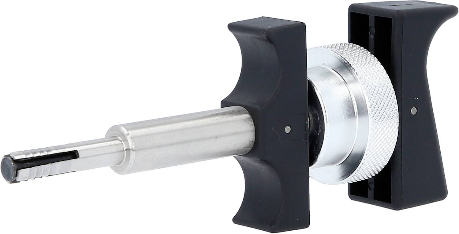 Ein schwarzes und silbernes mechanisches Gerät mit einem Griff und einem geriffelten Rad zur Anpassung, möglicherweise für präzise Einstellungen.