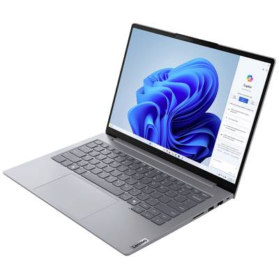 Ein grauer Laptop mit geöffneter Windows 11 Startseite auf dem Bildschirm. Tastatur und Trackpad sind sichtbar.