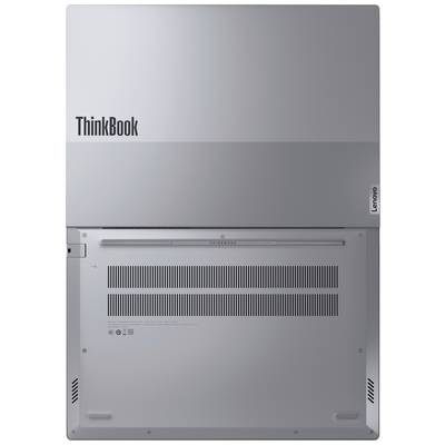 Die Unterseite eines silbernen Laptops mit der Aufschrift 'ThinkBook'. Lüftungsschlitze und Markenlogos sind sichtbar.