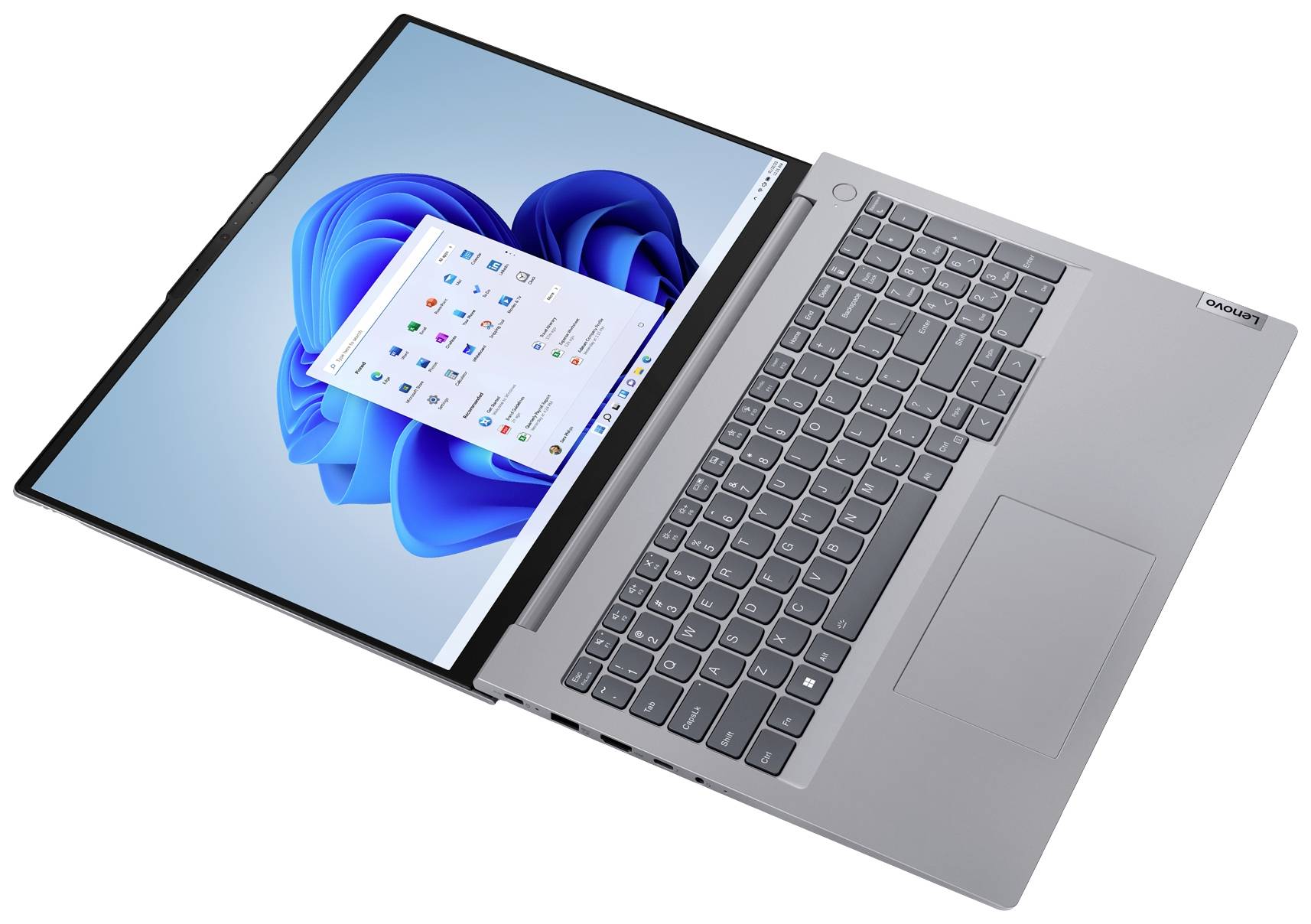Ein moderner Laptop mit geöffneter Windows-Oberfläche, zeigt App-Icons. Das Design ist schlank mit einer großen Tastatur und Touchpad.