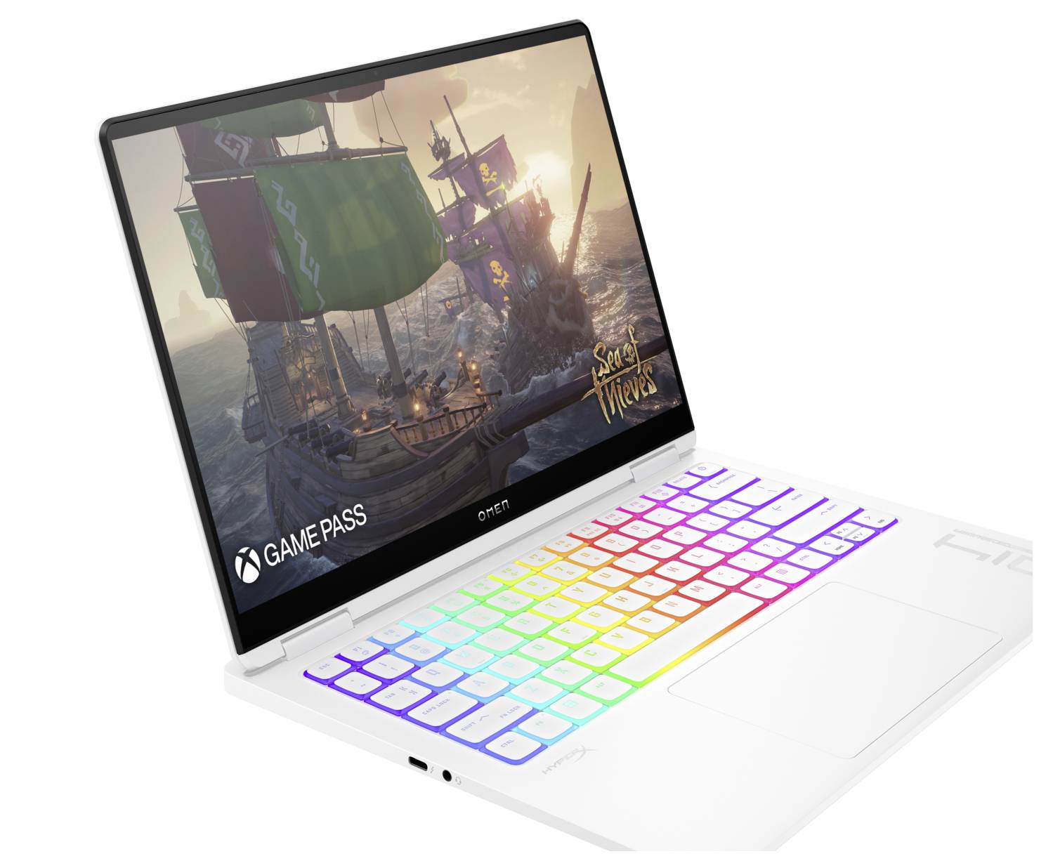Ein Laptop mit farbenfroher Tastatur zeigt ein Videospiel mit Piratenschiffen auf dem Bildschirm.