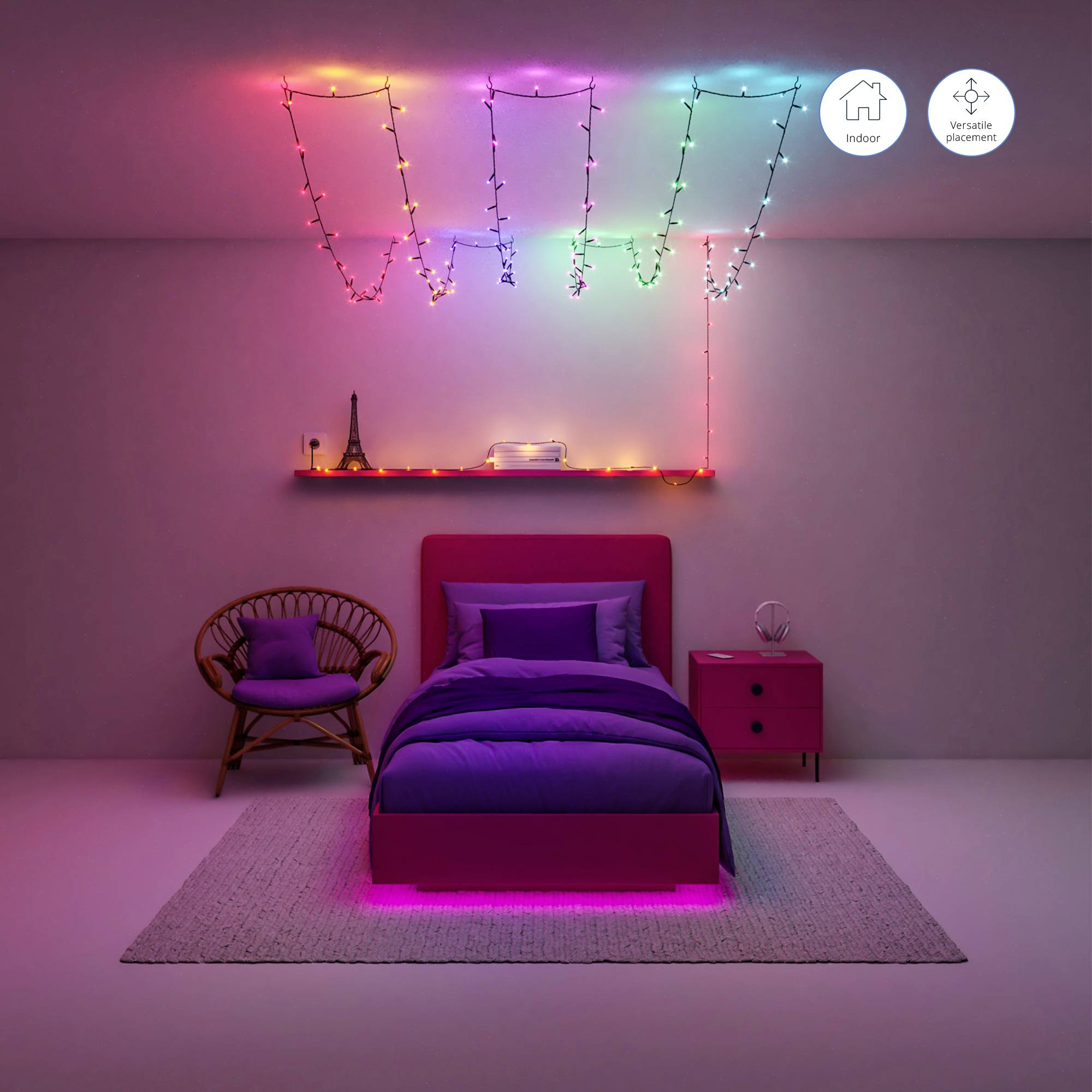 Ein bunt beleuchtetes Schlafzimmer mit Dekorationslichtern an der Wand, regenbogenfarbenem Bett und einer gemütlichen, modernen Einrichtung.